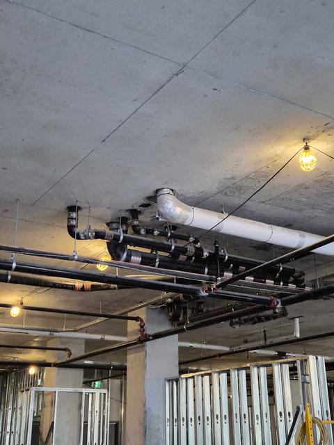 Overhead services rack and conduit