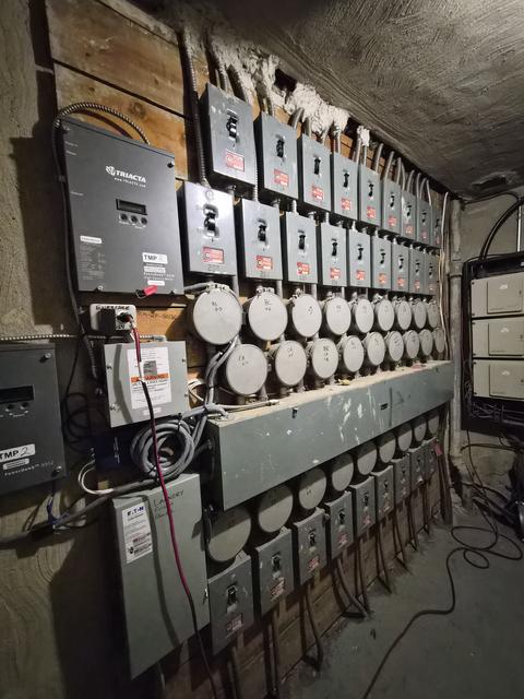 Multi-unit metering and distribution wall